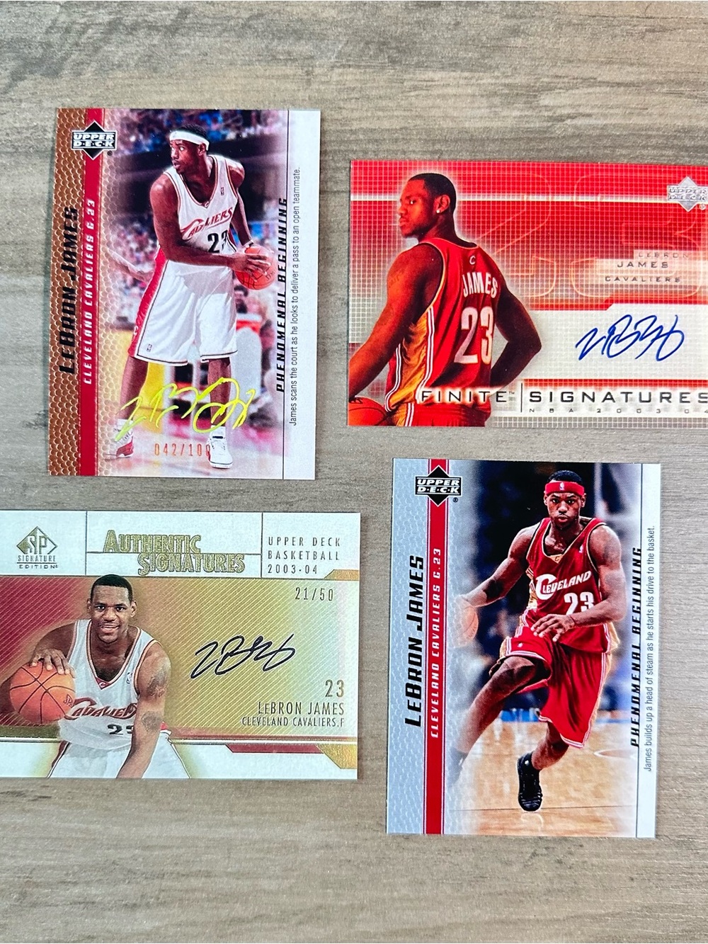 LeBron James Signed Rookie Lot of (4) Upper Deck Novelty Cards.